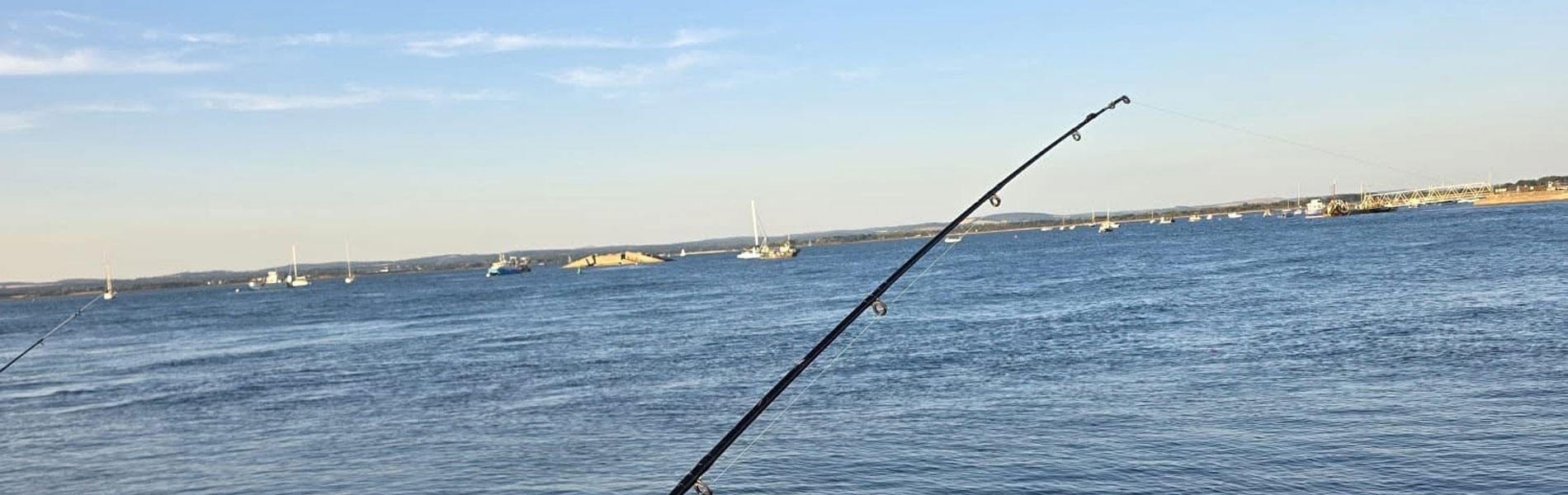 Fishing rod out at Eastney beach