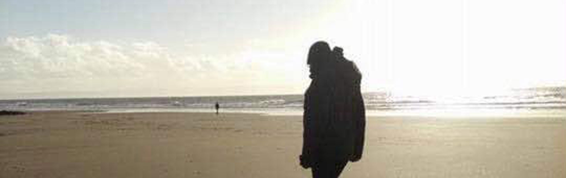 Person on the beach at Ogmore-by-Sea