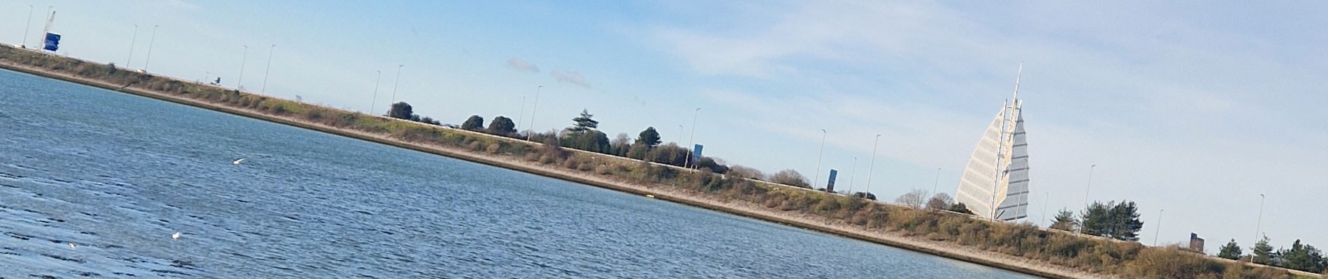 Portsmouth Hilsea Lines coast with the M275 and ship sails in the background