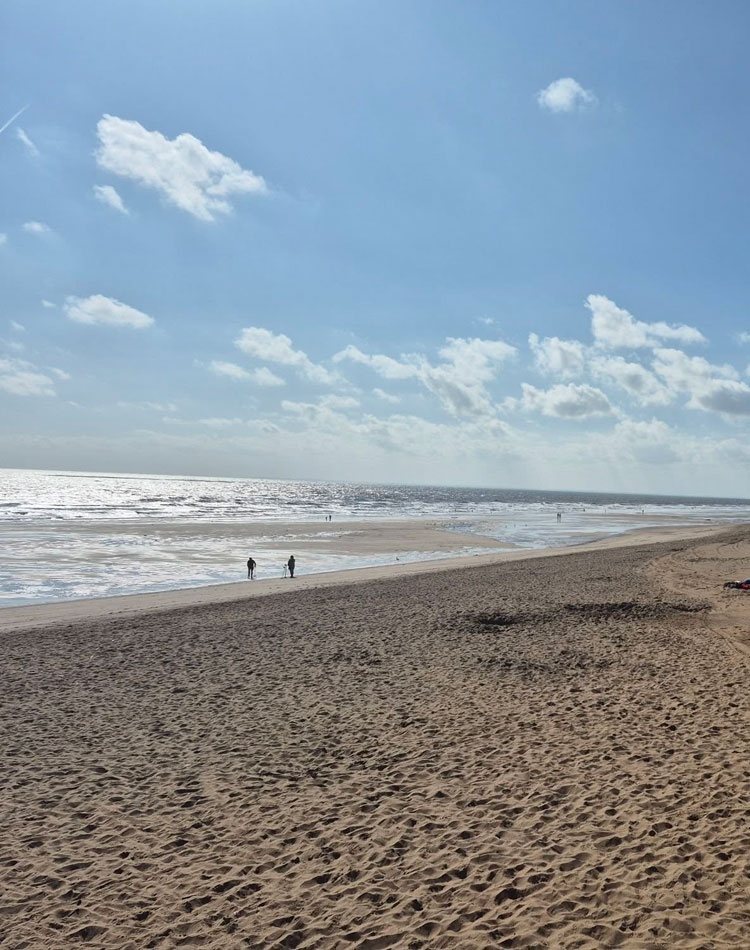 People walking on the Skegness beach